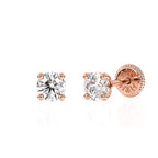 Rose gold stud earring with screwback post and clear round CZ stone.