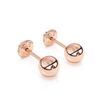 Round stud earrings in rose gold with screwback post.