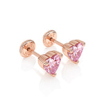 Rose gold stud earrings with a screwback post and pink heart shaped CZ stone.