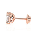 Rose gold stud earring with screwback post and clear round CZ stone.