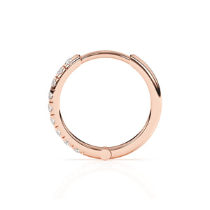 Rose gold huggie hoop with pave set clear CZ stone.