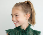 Child wearing All My Love, Pearl and Clear Pavé CZ Stud Earrings in Yellow Gold with screwback post.