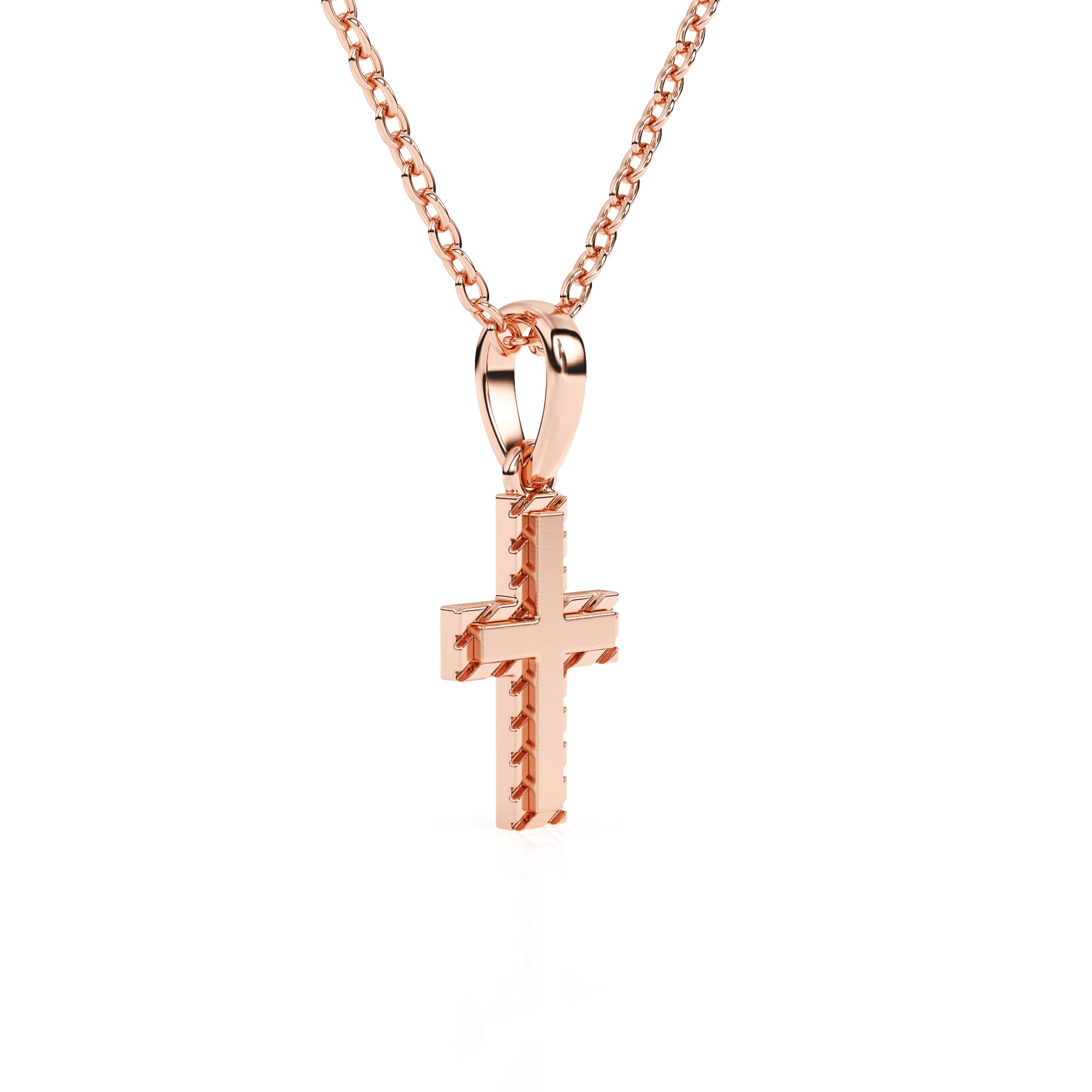 Rose gold cross necklace on a white background.