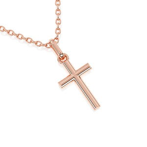 Rose gold cross necklace on a white background.