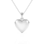 Sterling silver heart locket pendant on a white background.