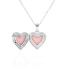 Inside view of sterling silver heart locket pendant on a white background.