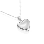 Sterling silver heart locket pendant on a white background.