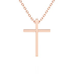 Rose gold cross necklace on a white background. 