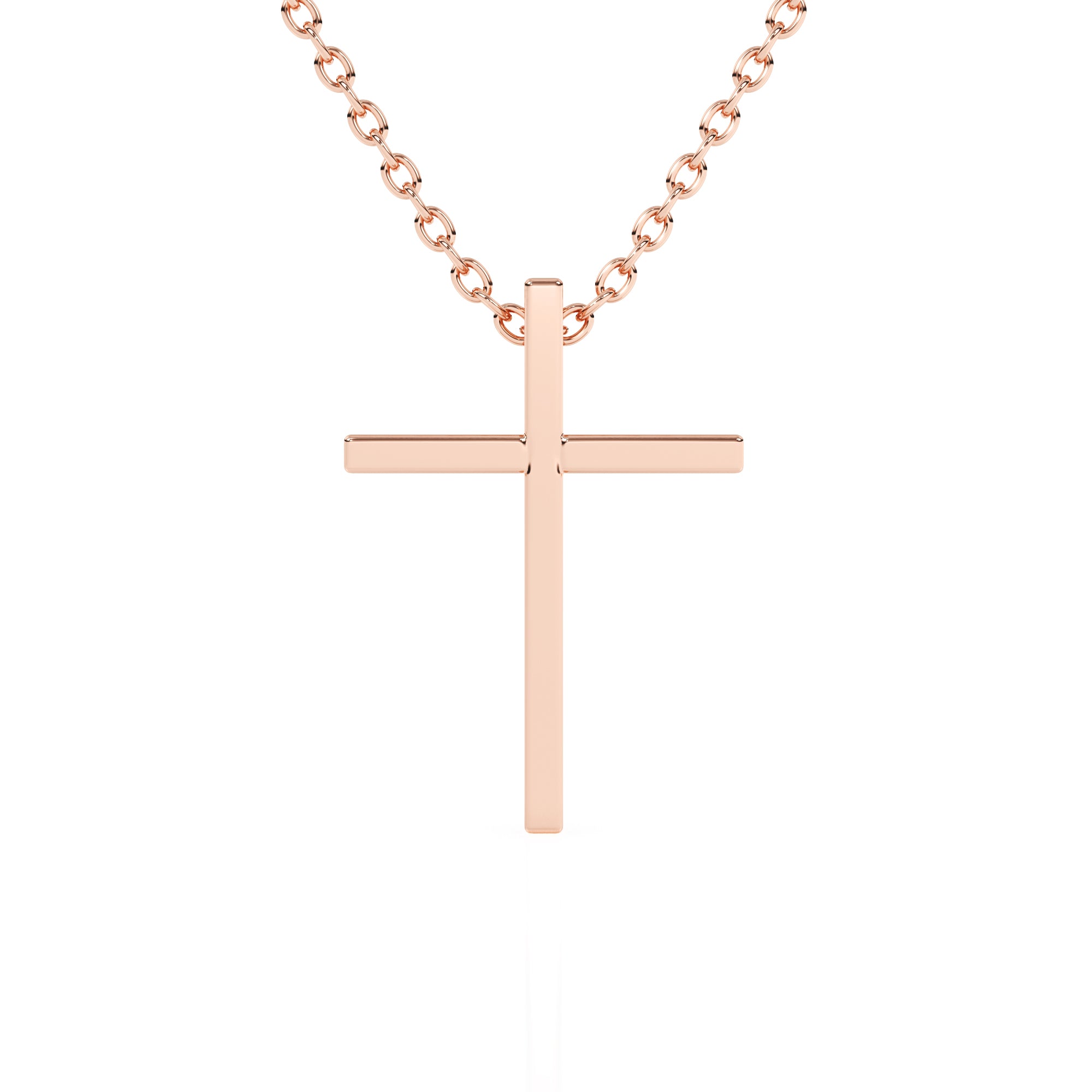 Rose gold cross necklace on a white background. 