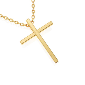 Yellow gold cross necklace on a white background.