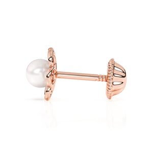Rose gold stud earrings with screwback post and flower shape with a pearl in the center.
