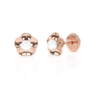 Rose gold earrings with screwback post and a ruffled flower petal with a pearl in the center. 
