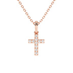 Rose gold cross pendant necklace on a white background