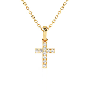Gold cross necklace with CZ stones on a white background.