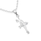 Sterling silver ballerina pendant with clear CZ stones on a necklace chain against a white background.