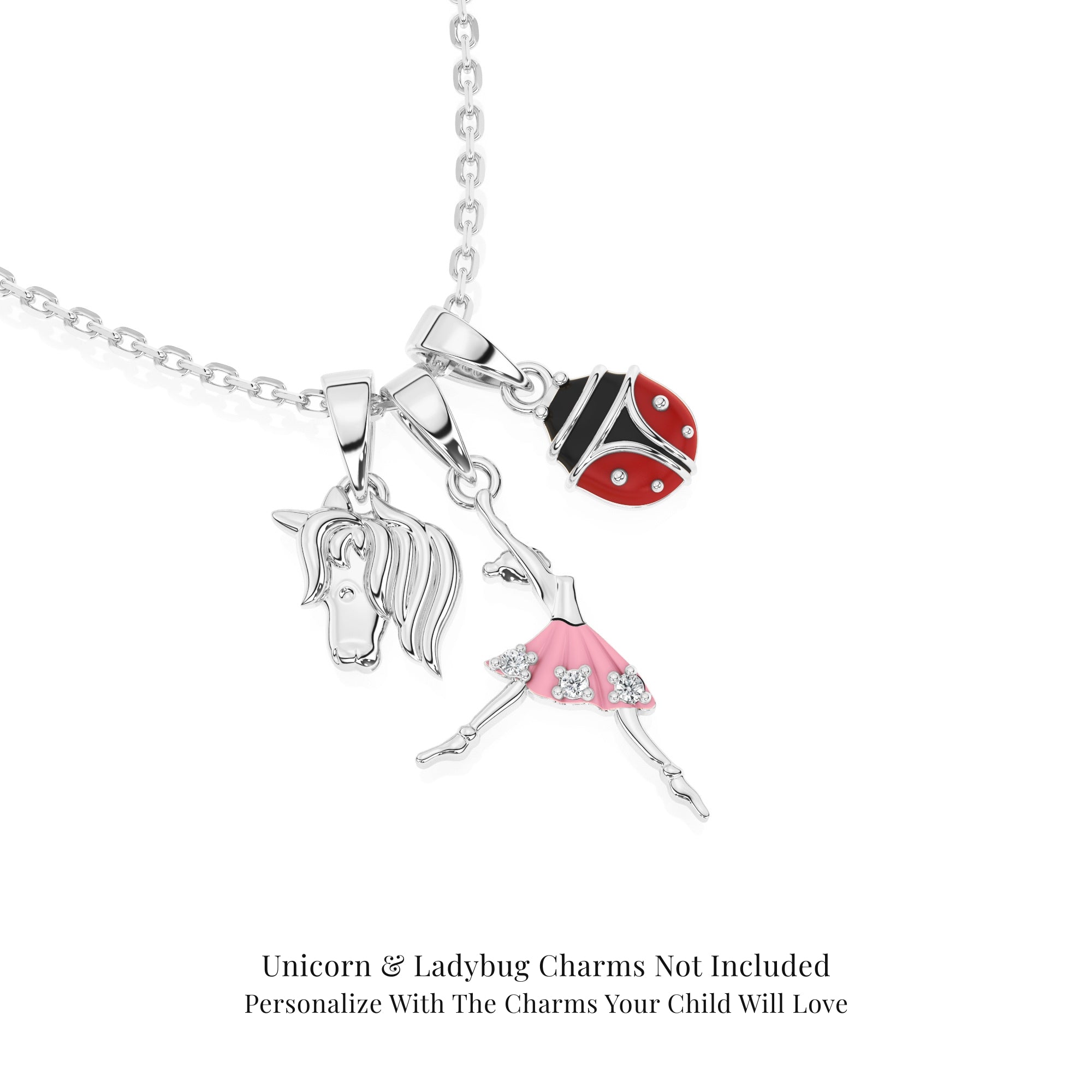 Sterling Silver necklace with ballerina pendant, unicorn, and ladybug charms on a white background.