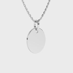 Sterling silver necklace with a round pendant on a white background video.
