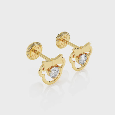 360-degree video of Miss Mouse with Bow clear round CZ stud earrings in solid 14K yellow gold with screw-back posts.