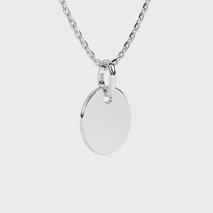 Sterling silver necklace with a round pendant on a white background video.