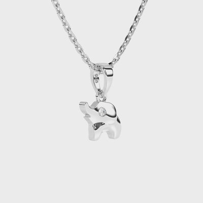 Sterling silver elephant pendant with clear CZ stone and necklace on a white background video.