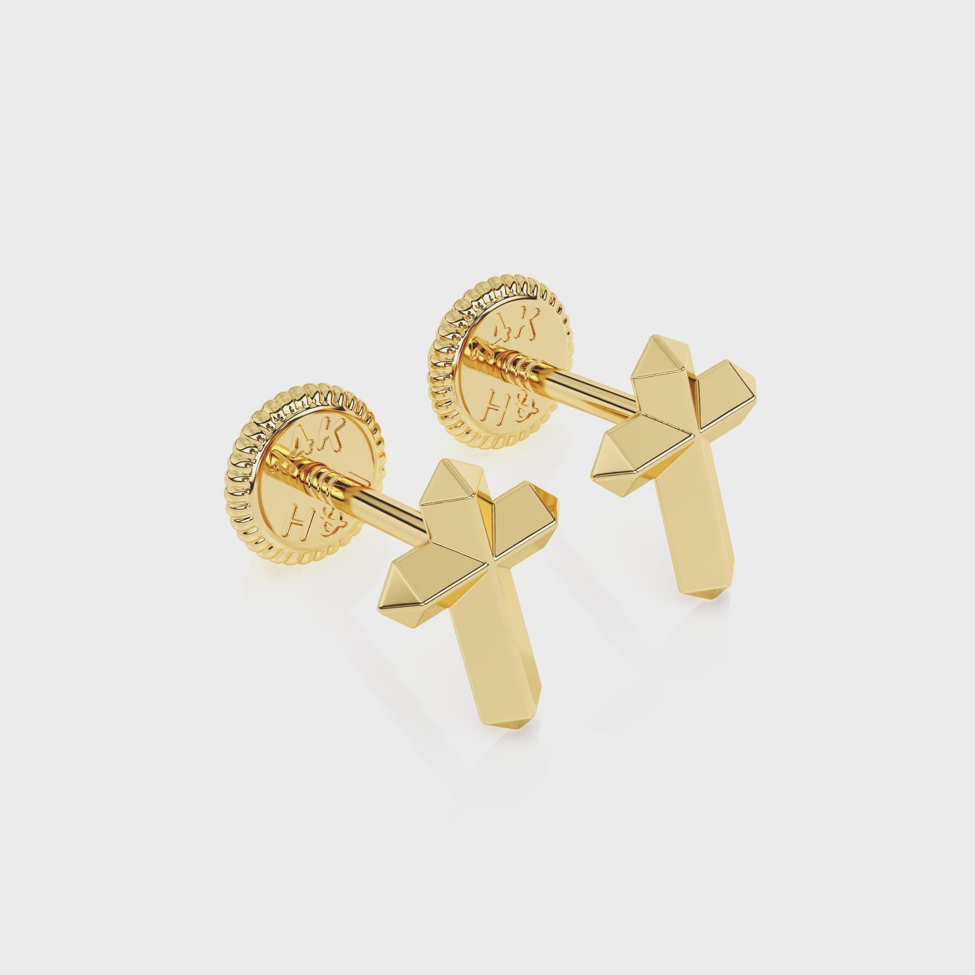 360-degree video of Elegant Cross stud earrings in solid 14K yellow gold with screw-back posts.