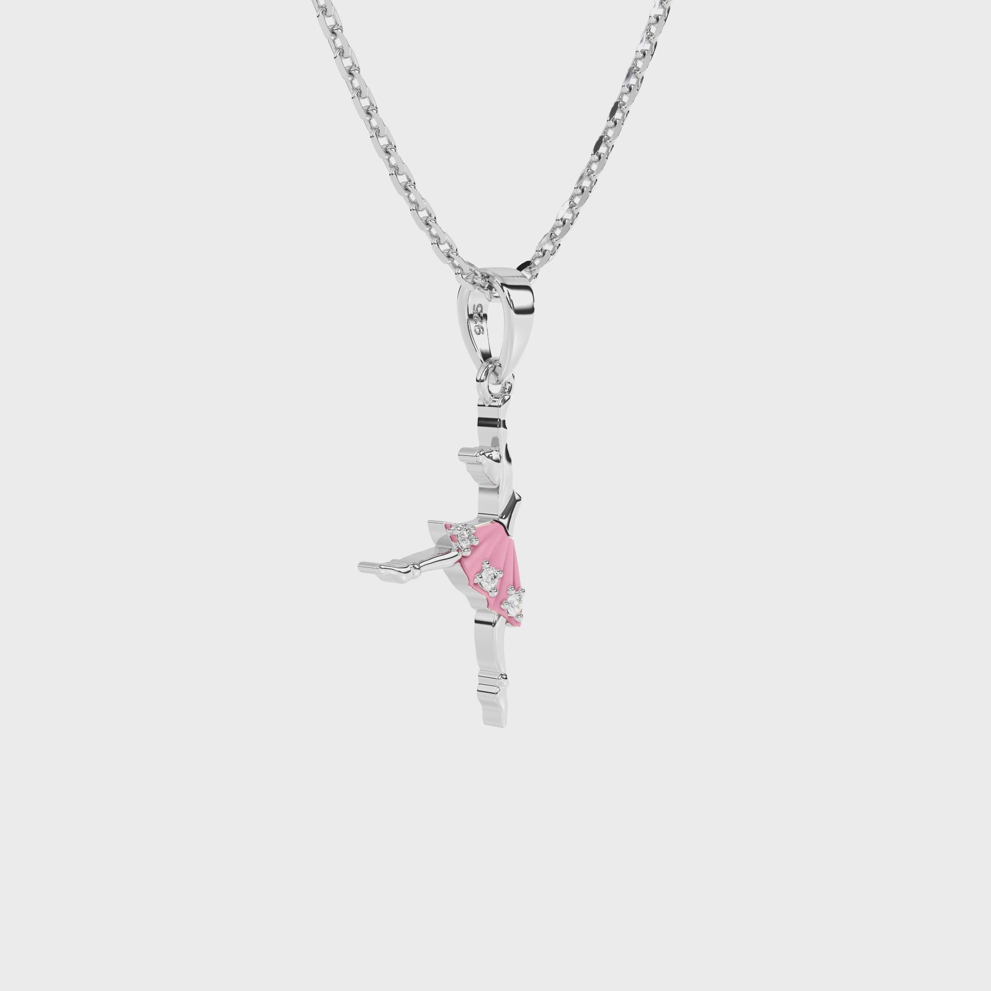 Sterling Silver necklace with ballerina pendant on a white background video.