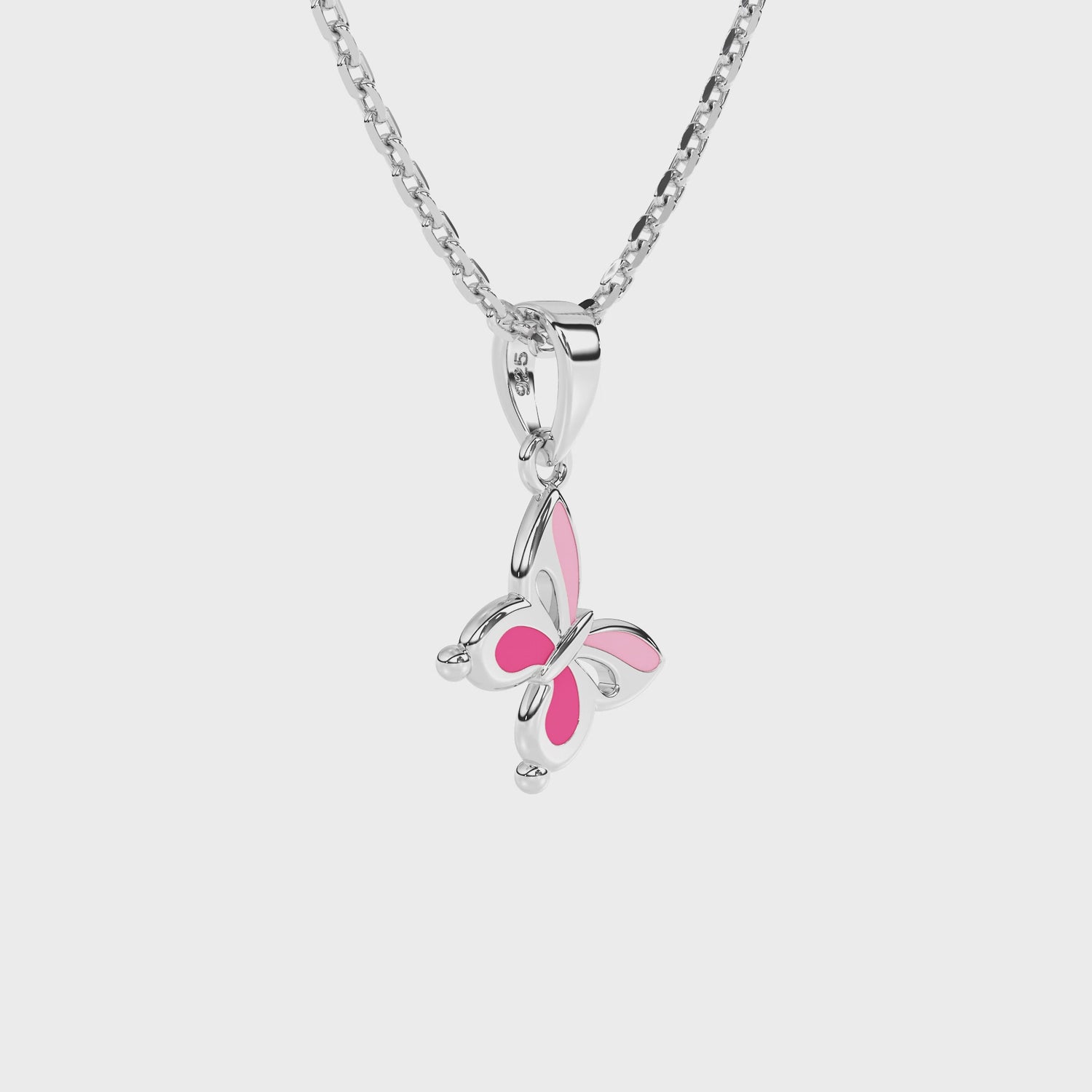 Sterling Silver butterfly pendant necklace with pink wings on a white background video.