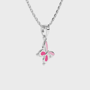 Sterling Silver butterfly pendant necklace with pink wings on a white background video.