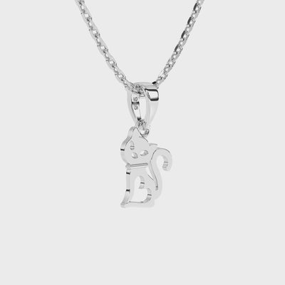 Sterling silver cat pendant necklace on a white background video.